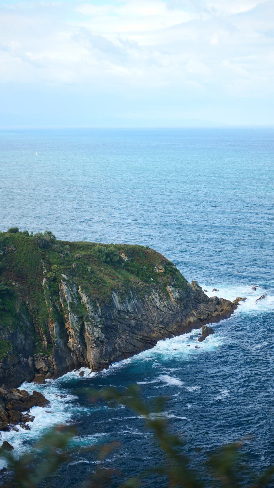 Green headland and open sea near San Sebastián
