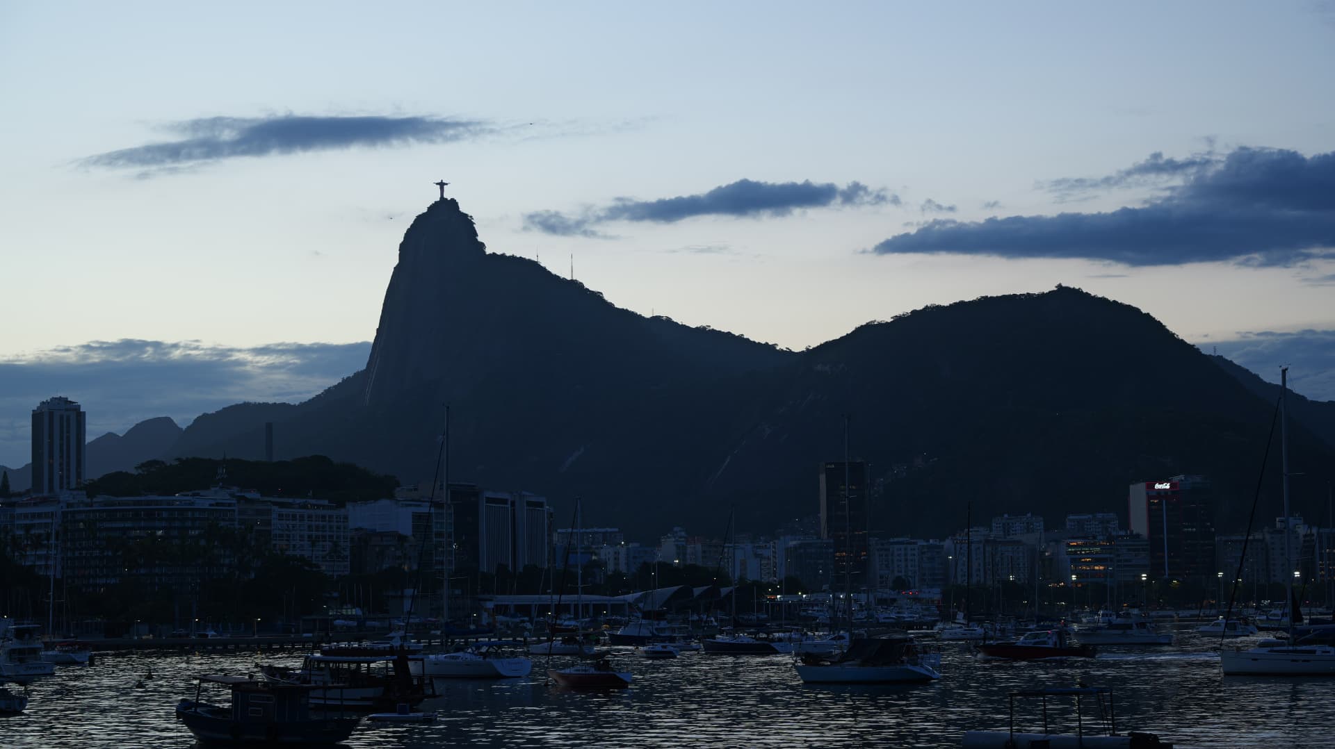 Sugarloaf and the Rio de Janeiro skyline at blue hour with boats in the marina