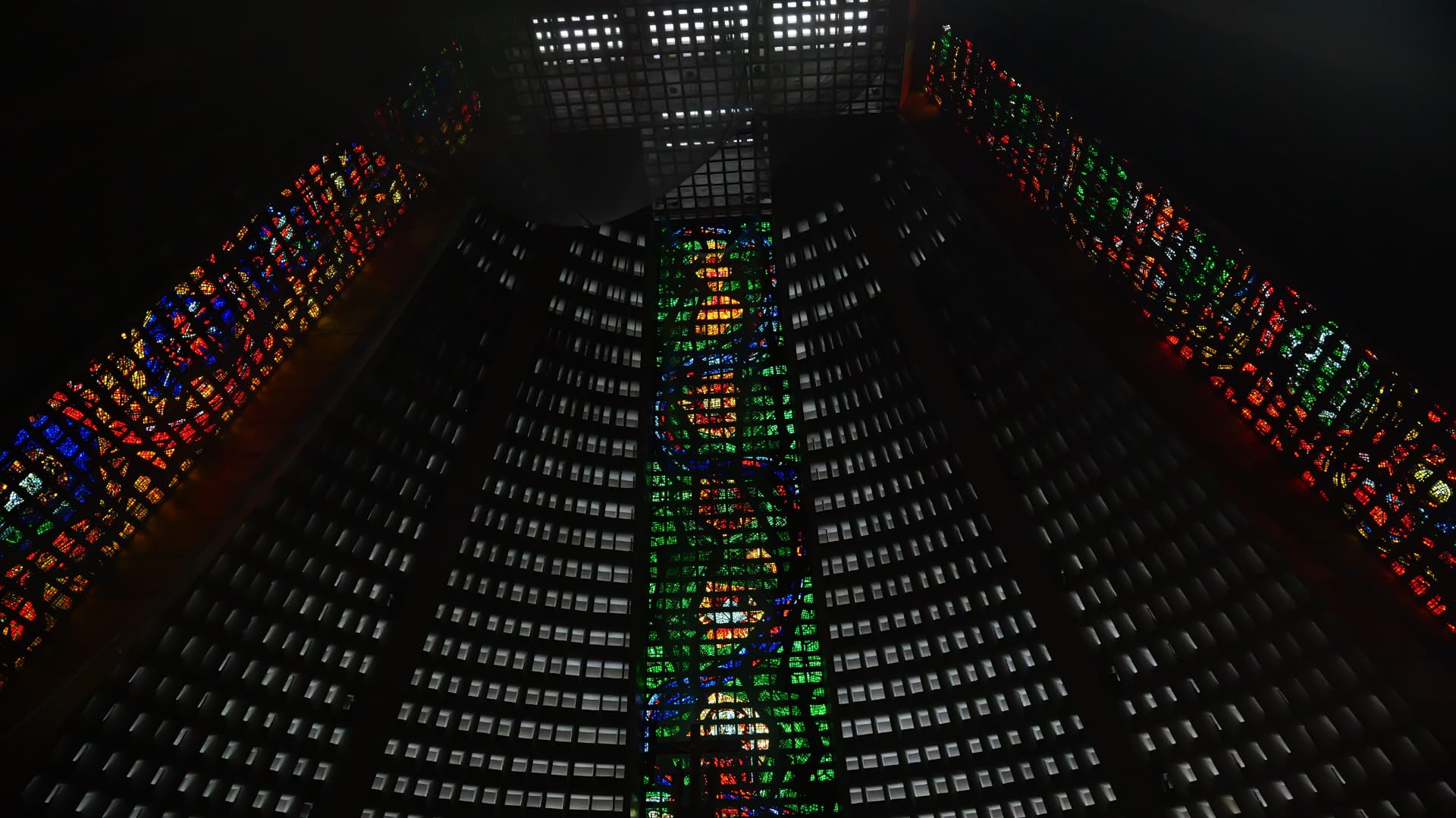 Stained-glass mosaic tiers of Rio de Janeiro's metropolitan cathedral at night